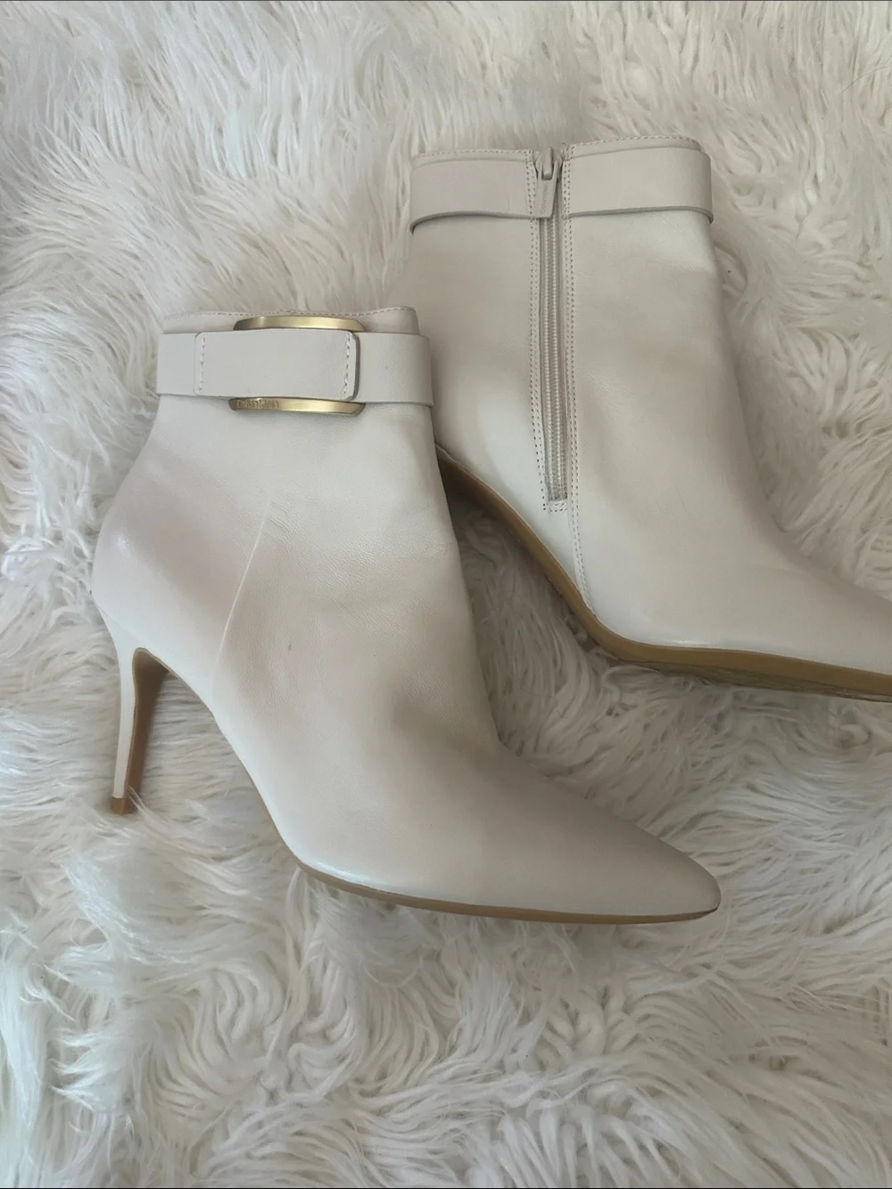 Calvin Klein Cream Leather Pointed-Toe Ankle Booties with Gold Buckle